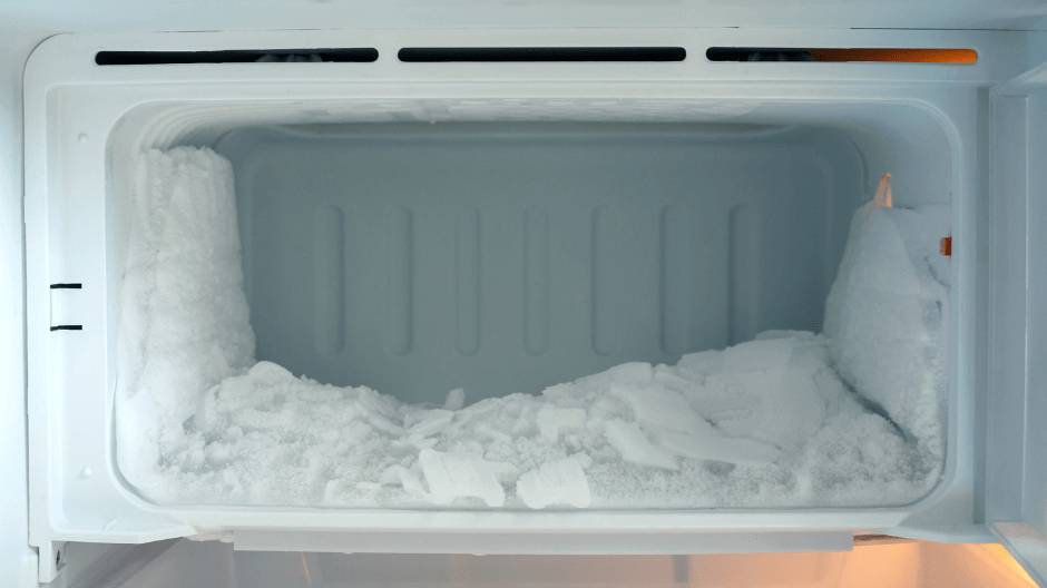 A freezer filled with frost