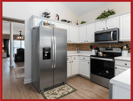 Modern kitchen featuring durable discount appliances designed for family use.